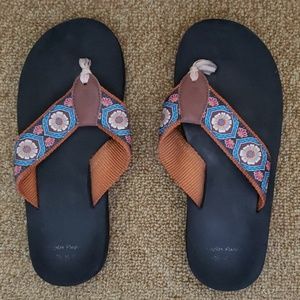 Douglas Paquette flip flops